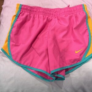 Pink, orange with teal trim